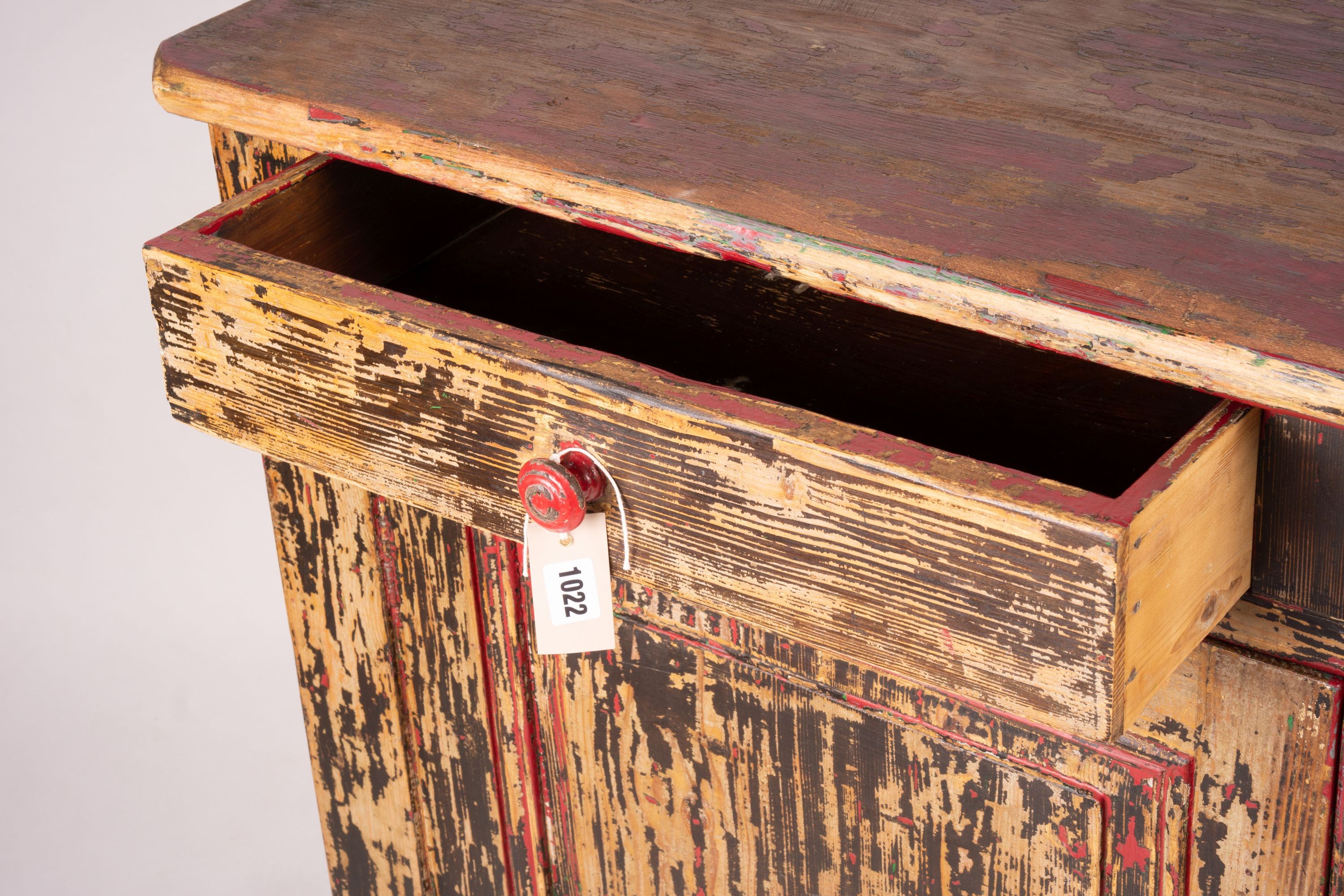 A 19th century French painted pine two door cabinet with scraped finish, width 140cm, depth 57cm, height 105cm